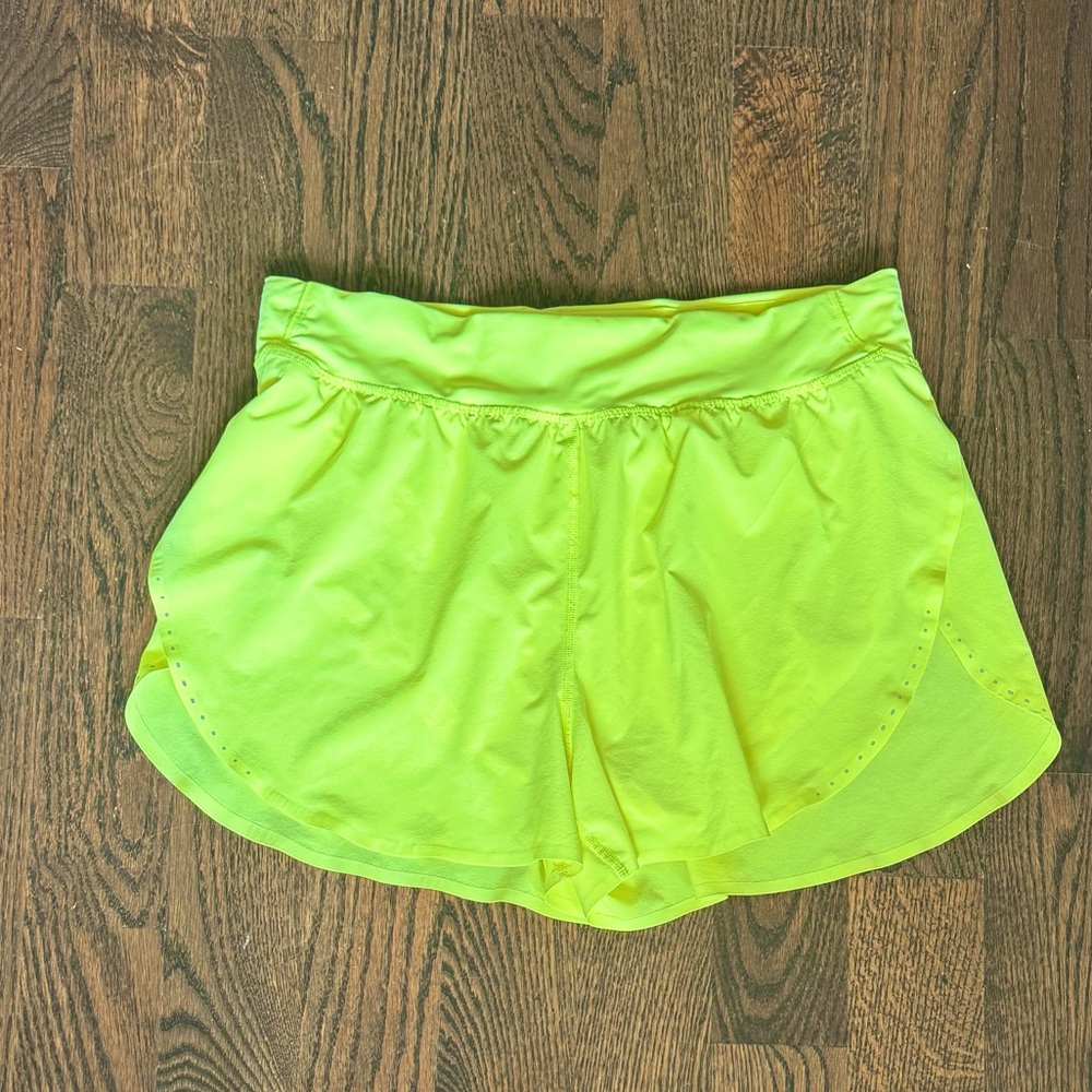 Lululemon Fast & Free bright yellow shorts, size 10.